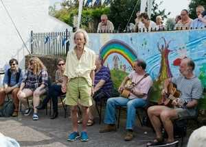 A welcome visitor sings in The Square